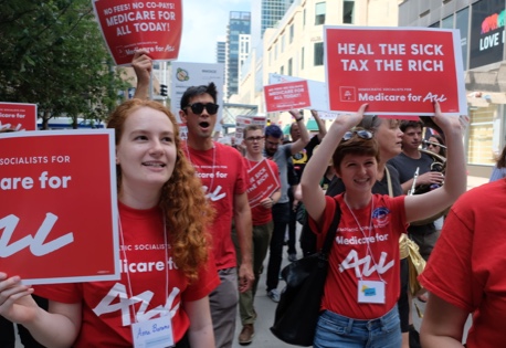 Democratic Socialists marching to demand Medicare for All